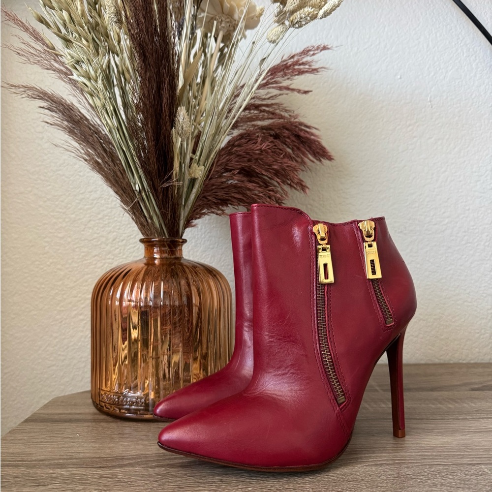 SCHUTZ Red Heeled Booties with Gold Zippers